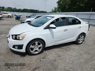 2015 Chevrolet Sonic LTZ z VIN 1G1JE5SB0F4111661, wystawiony jako Copart lot #58161225 z przebiegiem 158 286 mil mil oraz Szkoda całkowita • Salvage title. Historia ofert i sprzedaży dostępna na DreamBid. Obrazek 1.