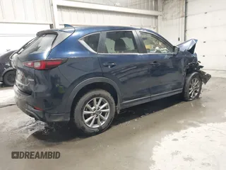 2023 Mazda CX-5 2.5 S Carbon Edition with VIN JM3KFBCM0P0173021, listed as a IAAI auction lot 41262695 with 42,186 mi miles. Bid and sale history available at carsss.com. Image 4.