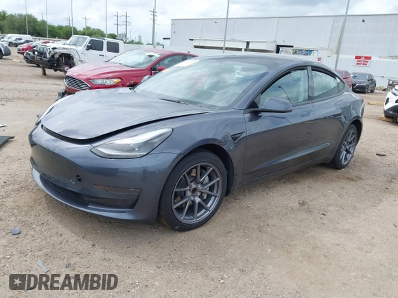 2023 Tesla Model 3 z VIN 5YJ3E1EA1PF642955, wystawiony jako IAAI lot #42121508 z przebiegiem 22 831 mil mil oraz . Historia ofert i sprzedaży dostępna na DreamBid. Obrazek 2.