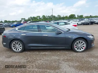 2016 Tesla Model S 90D with VIN 5YJSA1E25GF129482, listed as a IAAI auction lot 42588913 with 101,790 mi miles and . Bid and sale history available at DreamBid. Image 13.