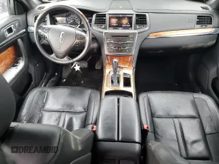 2014 Lincoln MKS with VIN 1LNHL9EK0EG602349, listed as a Copart auction lot 45211525 with 51,616 mi miles and Salvage Title. Bid and sale history available at DreamBid. Image 8.