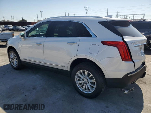 2019 Cadillac XT5 FWD with VIN 1GYKNARS1KZ121732, listed as a Copart auction lot 54882885 with 72,142 mi miles and Salvage title. Bid and sale history available at DreamBid. Image 2.
