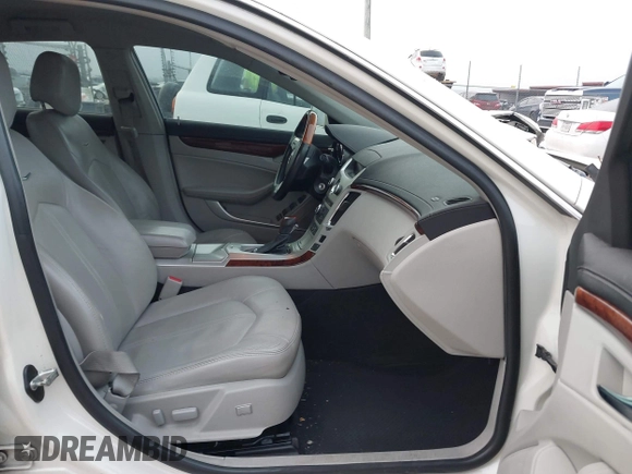2013 Cadillac CTS Luxury z VIN 1G6DE5E53D0178112, wystawiony jako IAAI lot #41753094 z przebiegiem 262 955 mil mil oraz . Historia ofert i sprzedaży dostępna na DreamBid. Obrazek 5.