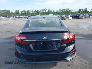 2021 Honda Clarity Touring z VIN JHMZC5F3XMC001253, wystawiony jako IAAI lot #42212102 z przebiegiem 35 649 mil mil oraz . Historia ofert i sprzedaży dostępna na DreamBid. Obrazek 16.