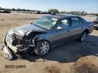 2006 Cadillac DTS 1SC z VIN 1G6KD57Y76U237062, wystawiony jako Copart lot #70920534 z przebiegiem 84 589 mil mil oraz Szkoda całkowita • Salvage title. Historia ofert i sprzedaży dostępna na DreamBid. Obrazek 1.