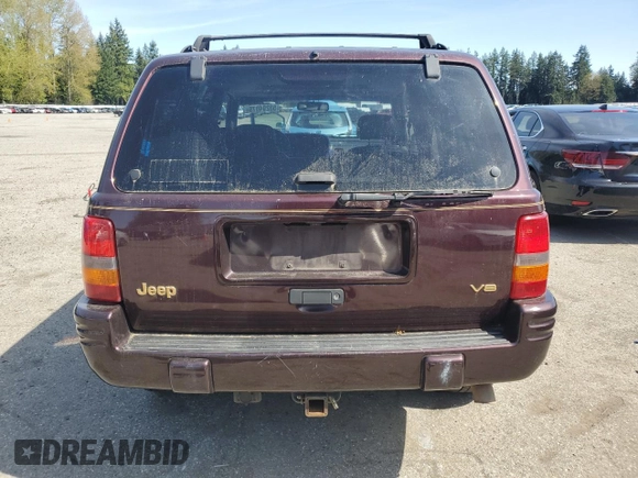 1997 Jeep Grand Cherokee Limited with VIN 1J4GZ78Y7VC727224, listed as a Copart auction lot 53204075 with 79,206 mi miles and Clean title. Bid and sale history available at DreamBid. Image 6.