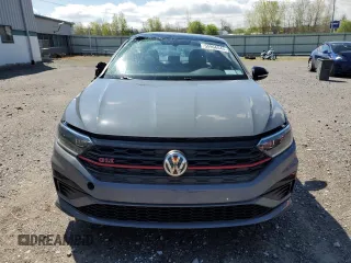 2019 Volkswagen Jetta GLI S z VIN 3VW6T7BUXKM153184, wystawiony jako Copart lot #55966045 z przebiegiem 44 632 mil mil oraz Szkody całkowita. Historia ofert i sprzedaży dostępna na DreamBid. Obrazek 5.