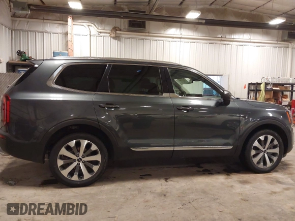 2022 Kia Telluride EX z VIN 5XYP3DHC0NG257513, wystawiony jako IAAI lot #42237366 z przebiegiem 43 936 mil mil oraz . Historia ofert i sprzedaży dostępna na DreamBid. Obrazek 13.