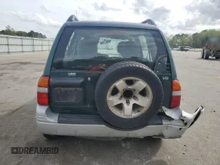 1999 Suzuki Grand Vitara JLX z VIN JS3TD62V0X4124366, wystawiony jako Copart lot #50885055 z przebiegiem 204 168 mil mil oraz Szkoda całkowita • Salvage title. Historia ofert i sprzedaży dostępna na DreamBid. Obrazek 6.