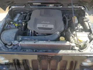 2014 Jeep Wrangler Unlimited Sahara with VIN 1C4BJWEGXEL150119, listed as a Copart auction lot 52378075 with 122,443 mi miles and Salvage Title. Bid and sale history available at carsss.com. Image 12.