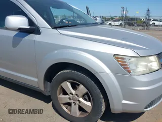 2009 Dodge Journey SXT with VIN 3D4GG57V19T211770, listed as a IAAI auction lot 42095045 with 164,610 mi miles. Bid and sale history available at carsss.com. Image 6.
