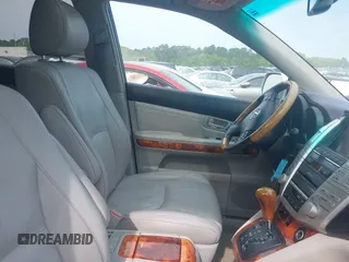 2007 Lexus RX 350 with VIN 2T2GK31U07C023916, listed as a IAAI auction lot 42026162 with 168,099 mi miles. Bid and sale history available at carsss.com. Image 5.