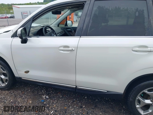 2017 Subaru Forester Touring with VIN JF2SJAWCXHH501702, listed as a IAAI auction lot 42080564 with 188,392 mi miles and . Bid and sale history available at DreamBid. Image 14.