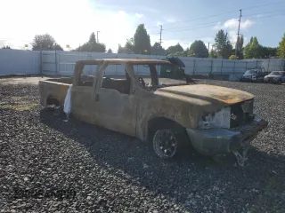 2002 Ford F-250 XL with VIN 1FTNW20S42EC74003, listed as a Copart auction lot 79458154 with Not Provided miles and Salvage Title. Bid and sale history available at DreamBid. Image 4.