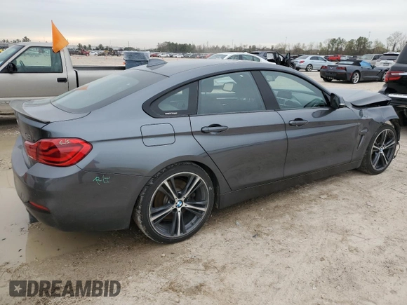 2018 BMW 4 Series 440i with VIN WBA4J5C53JBF07516, listed as a Copart auction lot 86118784 with 154,460 mi miles and Salvage Title. Bid and sale history available at DreamBid. Image 3.