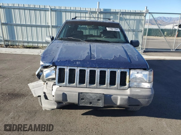 1997 Jeep Grand Cherokee Limited with VIN 1J4GZ78Y8VC737860, listed as a Copart auction lot 72981354 with 292,652 mi miles and Salvage Title. Bid and sale history available at carsss.com. Image 5.