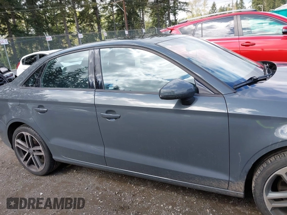 2017 Audi A3 Premium z VIN WAUAUGFF6H1044150, wystawiony jako IAAI lot #42002615 z przebiegiem 60 371 mil mil oraz . Historia ofert i sprzedaży dostępna na DreamBid. Obrazek 14.