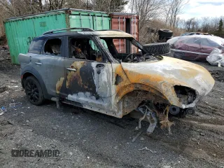 2017 MINI Countryman Cooper z VIN WMZYV5C33H3E01739, wystawiony jako Copart lot #52601615 z przebiegiem Nie podano mil oraz Nie do naprawy • Non repairable. Historia ofert i sprzedaży dostępna na DreamBid. Obrazek 4.