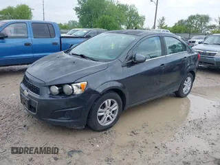 2014 Chevrolet Sonic LT with VIN 1G1JC5SH2E4228540, listed as a IAAI auction lot 42192166 with 115,489 mi miles and . Bid and sale history available at DreamBid. Image 2.