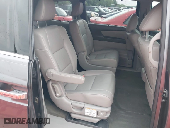 2016 Honda Odyssey Touring Elite with VIN 5FNRL5H96GB063176, listed as a IAAI auction lot 42157604 with 106,177 mi miles. Bid and sale history available at carsss.com. Image 8.