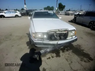 1990 Mercedes-Benz 300 CE с VIN WDBEA51D0LB167029, выставлен на аукционе Copart как лот 68581534 с пробегом 184 595 миль миль и Списание • Salvage title. История ставок и продаж доступна на DreamBid. Изображение 10.