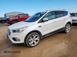 2019 Ford Escape Titanium z VIN 1FMCU9J9XKUA71524, wystawiony jako Copart lot #62522865 z przebiegiem 53 800 mil mil oraz Czysty tytuł • Clean title. Historia ofert i sprzedaży dostępna na DreamBid. Obrazek 1.