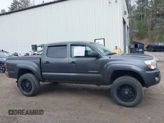 2009 Toyota Tacoma with VIN 3TMLU42N99M036667, listed as a IAAI auction lot 41856732 with 168,748 mi miles and . Bid and sale history available at DreamBid. Image 13.