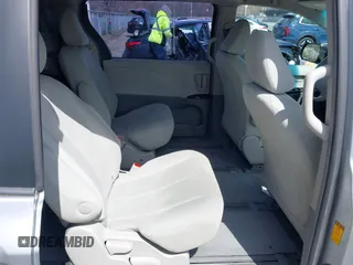 2013 Toyota Sienna L with VIN 5TDZK3DC9DS298333, listed as a IAAI auction lot 41941011 with 141,021 mi miles. Bid and sale history available at carsss.com. Image 8.