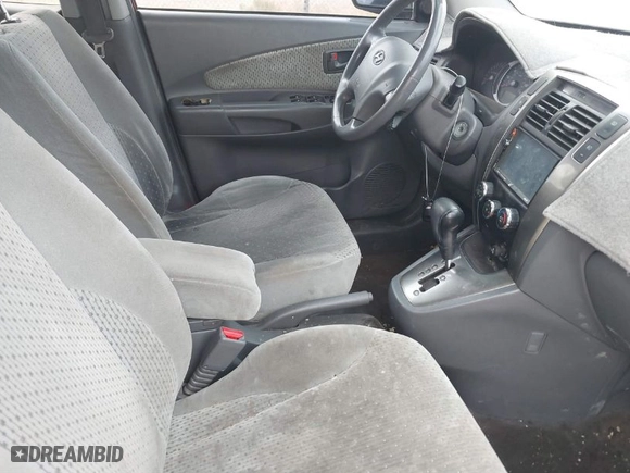 2005 Hyundai Tucson GLS with VIN KM8JN12D25U083891, listed as a IAAI auction lot 41734713 with 169,841 mi miles. Bid and sale history available at carsss.com. Image 5.