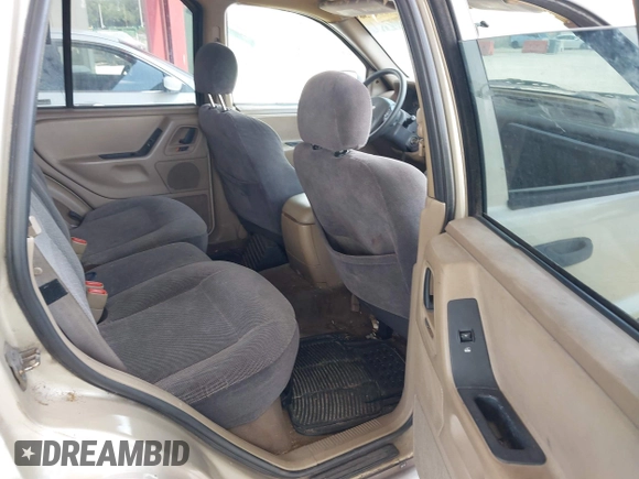 2001 Jeep Grand Cherokee Laredo with VIN 1J4GX48S81C589400, listed as a IAAI auction lot 42091559 with 219,698 mi miles and . Bid and sale history available at DreamBid. Image 8.