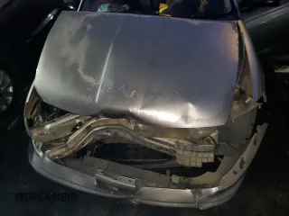 1999 Saturn SL z VIN 1G8ZK5271XZ316032, wystawiony jako Copart lot #50663015 z przebiegiem 164 288 mil mil oraz Nie do naprawy. Historia ofert i sprzedaży dostępna na DreamBid. Obrazek 11.