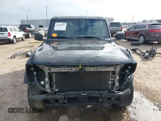2023 Ford Bronco z VIN 1FMDE5BHOPLB83665, wystawiony jako IAAI lot #41520897 z przebiegiem 16 678 mil mil oraz . Historia ofert i sprzedaży dostępna na DreamBid. Obrazek 13.