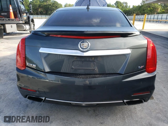 2014 Cadillac CTS Vsport Premium RWD z VIN 1G6AV5S80E0171279, wystawiony jako Copart lot #63759434 z przebiegiem 129 154 mil mil oraz Szkody całkowita. Historia ofert i sprzedaży dostępna na DreamBid. Obrazek 6.