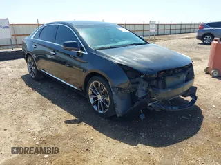 2013 Cadillac XTS z VIN 2G61N5S36D9175393, wystawiony jako IAAI lot #42017733 z przebiegiem 133 759 mil mil oraz . Historia ofert i sprzedaży dostępna na DreamBid. Obrazek 1.