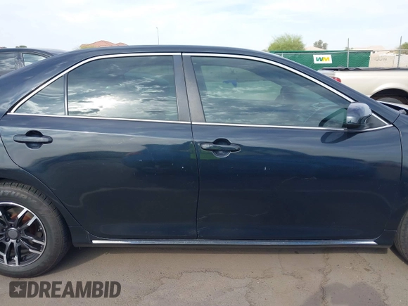 2014 Toyota Camry L with VIN 4T4BF1FK7ER438134, listed as a IAAI auction lot 41881798 with 137,886 mi miles. Bid and sale history available at carsss.com. Image 13.