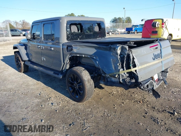 2022 Jeep Gladiator High Altitude with VIN 1C6HJTFGXNL124571, listed as a IAAI auction lot 41272140 with 14,198 mi miles and . Bid and sale history available at DreamBid. Image 3.