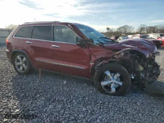 2012 Jeep Grand Cherokee Overland with VIN 1C4RJFCG1CC113295, listed as a Copart auction lot 49785785 with 0 mi miles and Salvage Title. Bid and sale history available at carsss.com. Image 4.