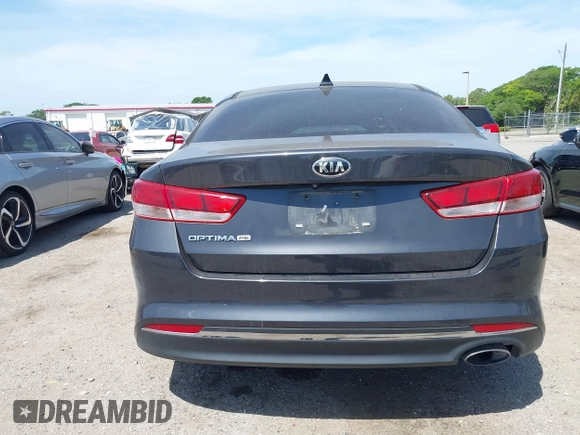 2017 Kia Optima LX with VIN 5XXGT4L30HG157122, listed as a IAAI auction lot 42084378 with 175,215 mi miles. Bid and sale history available at carsss.com. Image 17.