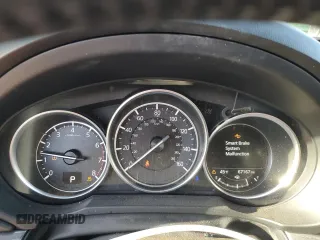 2018 Mazda CX-5 Grand Touring z VIN JM3KFBDMXJ0390680, wystawiony jako Copart lot #51654345 z przebiegiem 67 167 mil mil oraz Szkoda całkowita • Salvage title. Historia ofert i sprzedaży dostępna na DreamBid. Obrazek 9.