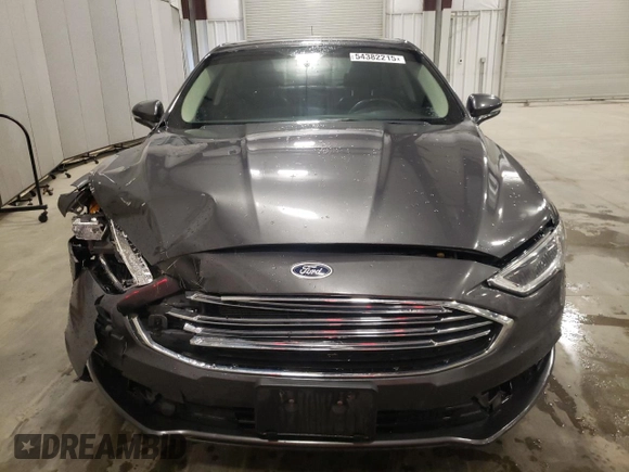 2018 Ford Fusion SE z VIN 3FA6P0HD6JR260522, wystawiony jako Copart lot #54382215 z przebiegiem 151 611 mil mil oraz Szkoda całkowita • Salvage title. Historia ofert i sprzedaży dostępna na DreamBid. Obrazek 5.