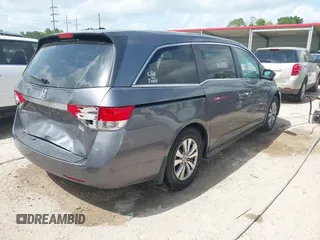 2014 Honda Odyssey EX-L with VIN 5FNRL5H69EB075115, listed as a IAAI auction lot 42046386 with 200,340 mi miles and . Bid and sale history available at carsss.com. Image 4.