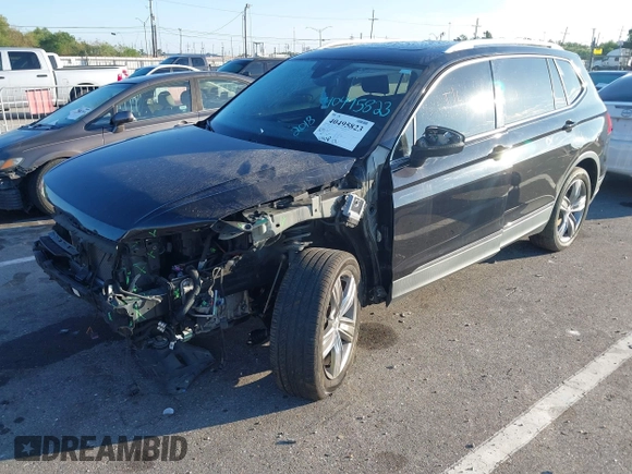 2018 Volkswagen Tiguan SEL Premium with VIN 3VV5B7AX1JM002585, listed as a IAAI auction lot 40495823 with 82,376 mi miles and . Bid and sale history available at DreamBid. Image 6.