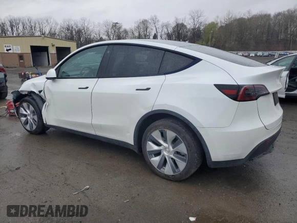 2023 Tesla Model Y Long Range with VIN 7SAYGDEEXPA122953, listed as a Copart auction lot 52627095 with Not Provided miles and Salvage Title. Bid and sale history available at DreamBid. Image 2.