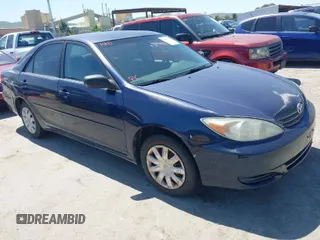 2002 Toyota Camry LE z VIN JTDBE32K520025490, wystawiony jako IAAI lot #42030705 z przebiegiem 190 144 mil mil oraz . Historia ofert i sprzedaży dostępna na DreamBid. Obrazek 1.