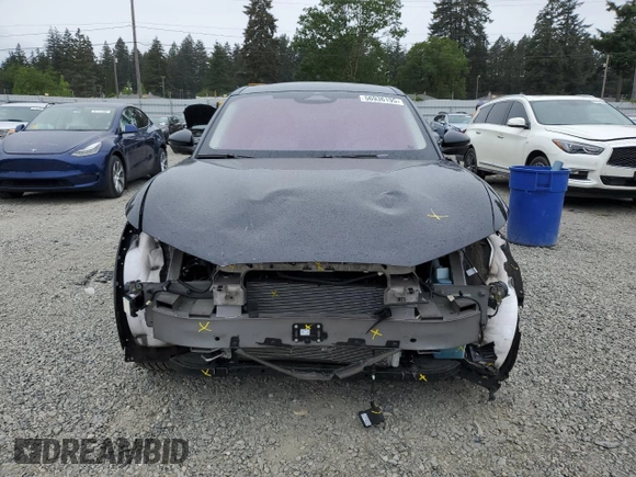 2022 Ford Mustang Mach-E Premium with VIN 3FMTK3SS9NMA41704, listed as a Copart auction lot 56936195 with 19,217 mi miles and Salvage title. Bid and sale history available at DreamBid. Image 5.