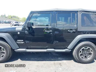 2018 Jeep Wrangler JK Unlimited Sport S with VIN 1C4BJWDG9JL816592, listed as a IAAI auction lot 42187279 with 91,169 mi miles. Bid and sale history available at carsss.com. Image 14.