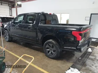 2023 Ford F-150 Lightning Pro with VIN 1FTVW1EV5PWG59228, listed as a IAAI auction lot 40838790 with Not Provided miles and . Bid and sale history available at DreamBid. Image 3.
