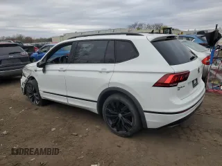 2021 Volkswagen Tiguan SE with VIN 3VV2B7AX8MM021965, listed as a Copart auction lot 53711125 with 59,554 mi miles and Salvage Title. Bid and sale history available at DreamBid. Image 2.