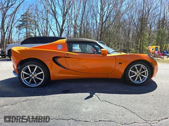 2007 Lotus Elise z VIN SCCPC11137HL30017, wystawiony jako Copart lot #52991635 z przebiegiem 3930 mil mil oraz Tytuł czysty. Historia ofert i sprzedaży dostępna na DreamBid. Obrazek 2.