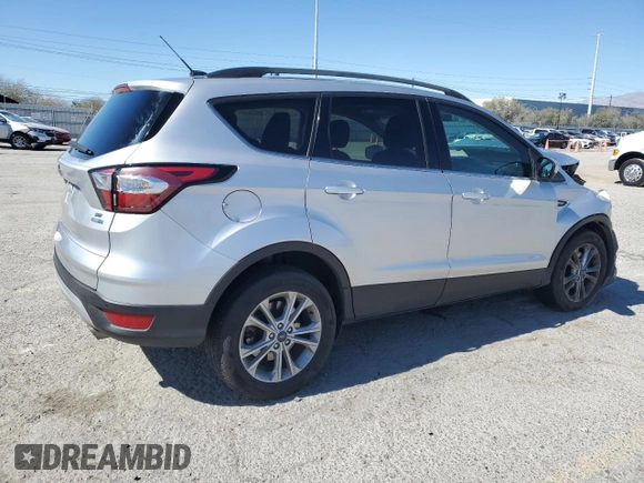 2017 Ford Escape SE with VIN 1FMCU9G90HUA39911, listed as a Copart auction lot 47670195 with 124,269 mi miles and Salvage Title. Bid and sale history available at carsss.com. Image 3.